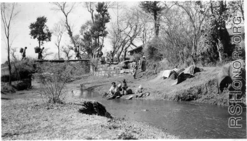 Bashful washers, the day of the mounds, South of Yangkai, Spring 1945.   From the collection of Frank Bates.