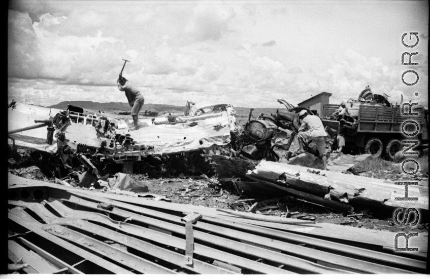 Chinese workers hack up aluminum aircraft in boneyard for American aircraft at an American airbase in Luliang, China--many of these were used as salvage for spare and repair parts for planes that were still flying, and the unusable remains apparently given away or sold locally for the metal.