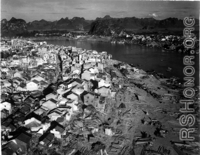 Aerial view of Liuzhou, Guangxi, China, during WWII, showing the break-neck post-occupation recovery and rebuilding after the Japanese retreat. 1945.