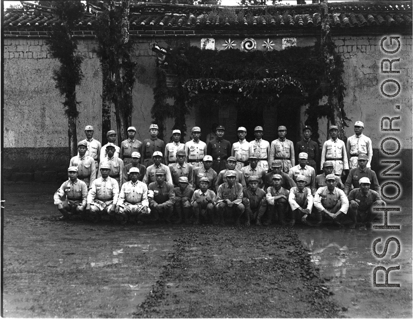 Chinese soldiers pose for group shot during rally.