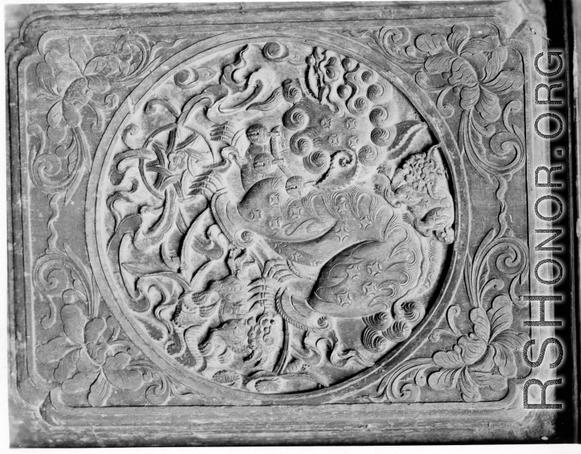 Carved wooden door or screen panel in Yunnan, China, during WWII.