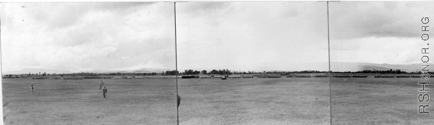 Panorama of Chinese soldiers in numerous ranks during exercises in southern China, probably Yunnan province, or possibly in Burma.