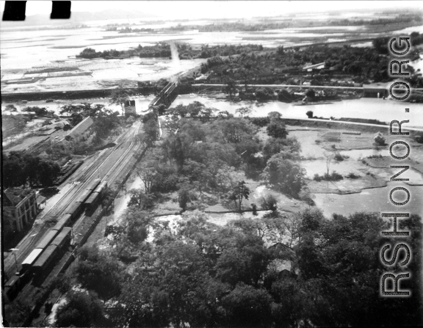 Bombing on Phu Lang Thuong railway bridge over the Thuong River at Bắc Giang City in French Indochina (Vietnam), during WWII. In northern Vietnam, and along a critical rail route used by the Japanese.  Coordinates:  21°16'32.69"N 106°11'9.28"E
