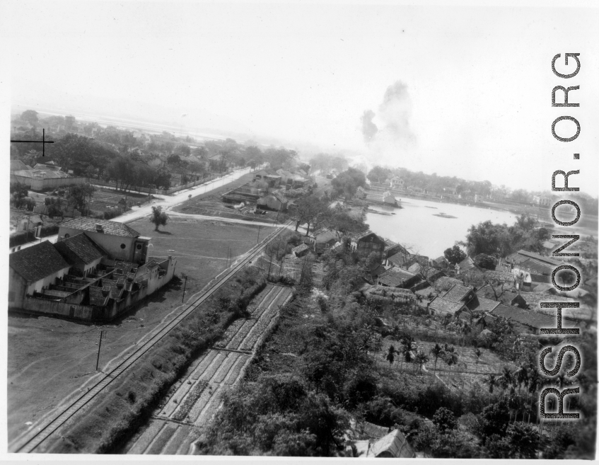 Bombing on Phu Lang Thuong railway bridge over the Thuong River at Bắc Giang City in French Indochina (Vietnam), during WWII. In northern Vietnam, and along a critical rail route used by the Japanese.  Coordinates:  21°16'32.69"N 106°11'9.28"E