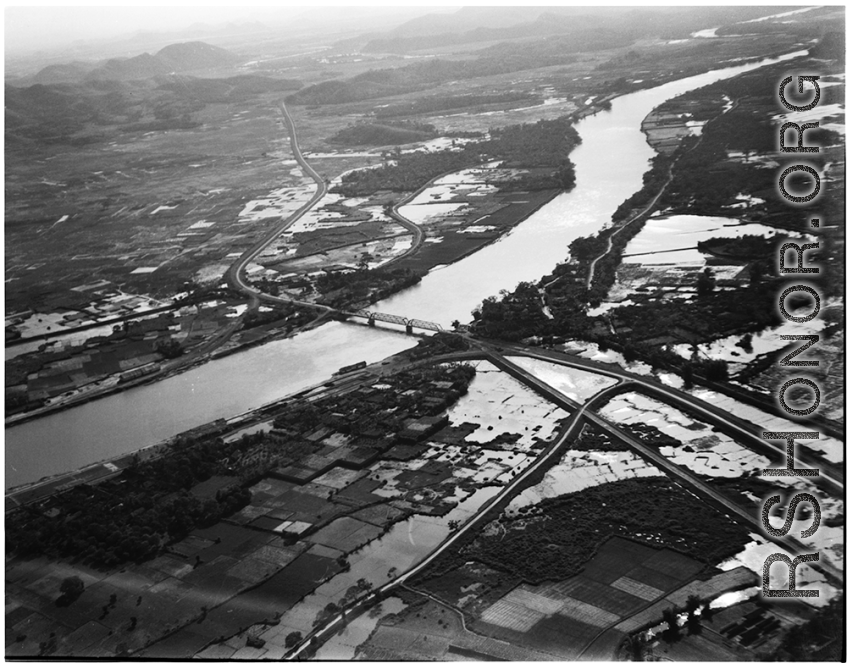 Bombing of Đò Lèn Bridge in Hà Trung Town in French Indochina (Vietnam), during WWII. In northern Vietnam, and along a critical rail route used by the Japanese.