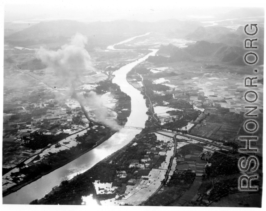 Bombing of Đò Lèn Bridge in Hà Trung Town in French Indochina (Vietnam), during WWII. In northern Vietnam, and along a critical rail route used by the Japanese.