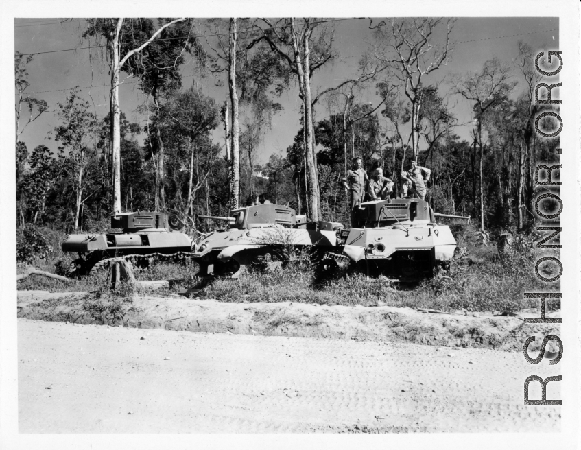 Ruined American tanks along Burma Road.  797th Engineer Forestry Company in Burma.  During WWII.