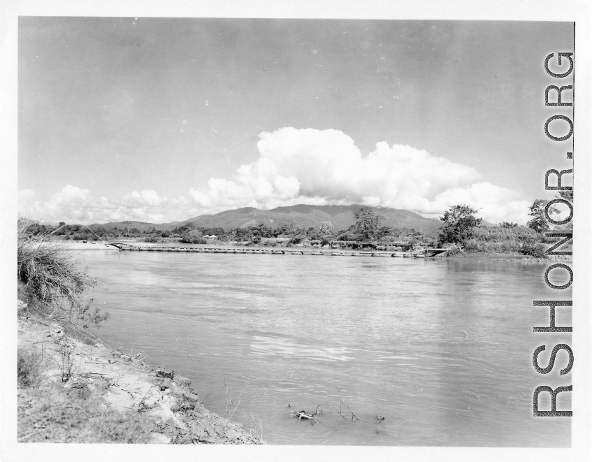 797th Engineer Forestry Company in Burma: Pontoon bridge over a river on the Burma Road.  During WWII.