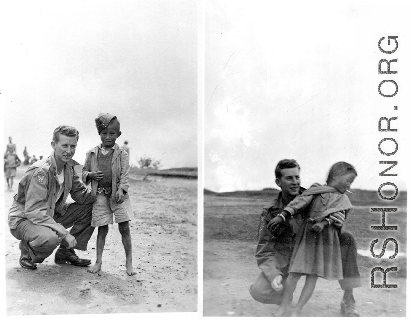 GI posing with cute kids in Burma, during WWII.