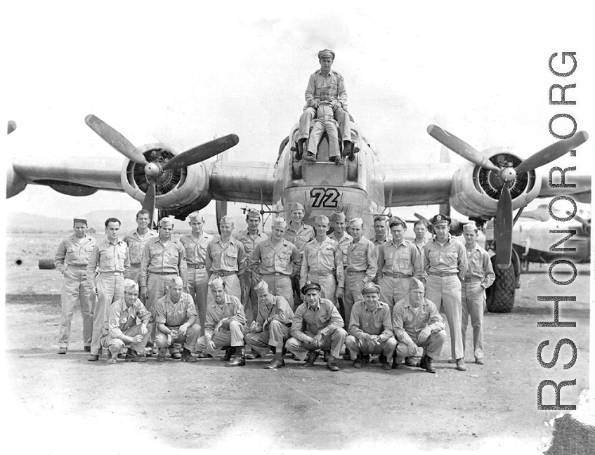 Possibly personnel of the 9th Bombardment Squadron, 7th Bombardment Group, 10th Air Force.  Posing on B-24 bomber, with small Chinese boy. During WWII. This seems to be the same group as in this image.  Some names:  Barry Diamond. Bronx, New York.  Joe T. Daniels. North Carolina.  "Sam" Isamu S. Higurashi. Seattle, WA. ASN 37716688.  Dan Holland. Chicago, Illinois.  Tom Livingford. Lewistown, PA.  Bill Muir. Concord, New Hampshire.  C. N. Gordon. Seattle, WA.  L. L. Penson. De Queen, Arkansas.  Dom P. Tatan