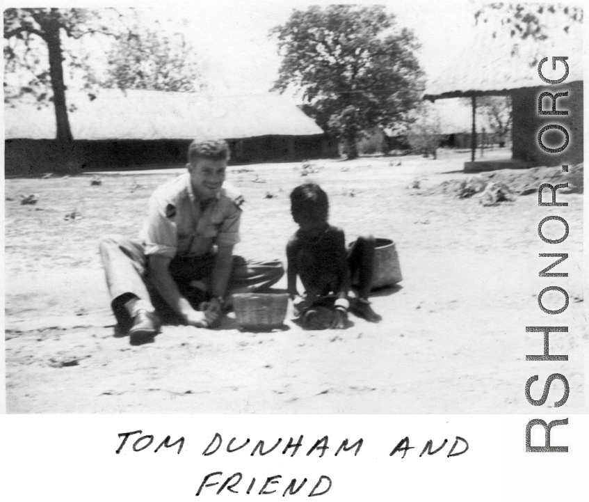 Tom Dunham and local boy in Burma or India.  22nd Bombardment Squadron, in the CBI.