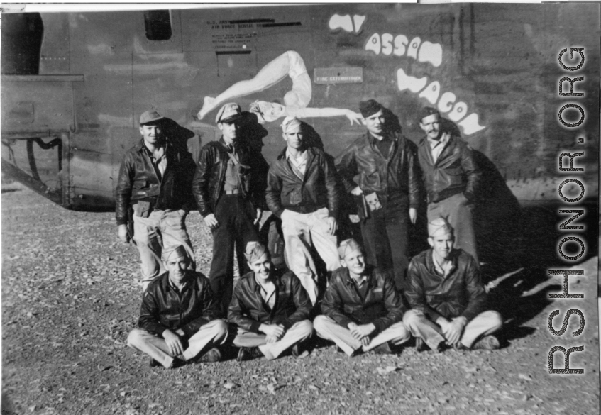 Crew of nine flyers stands before F-7A "My Assam Wagon," #42-64170.  24th Combat Mapping Squadron, 8th Photo Reconnaissance Group, 10th Air Force.