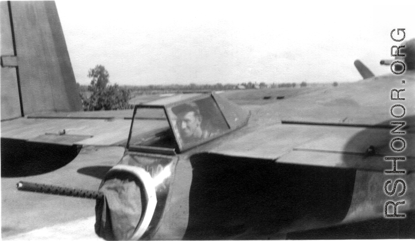 Jim Lane in tail gun (.50 cal.) put in B-25 #81, summer of 1943, Chaukulia, India.