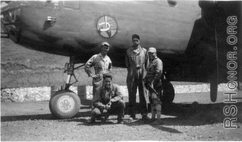 Pete Bertani, Peterson, Frank Bates, unknown, posing before a B-25 Mitchell in a revetment in China, likely Yangkai.