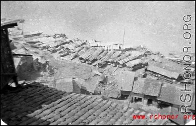 Boats clustered on the Yellow River during WWII, possibly in or near Lanzhou.