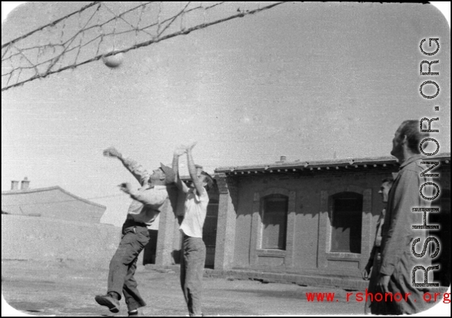 GIs of SACO play volleyball in northern China, during WWII.