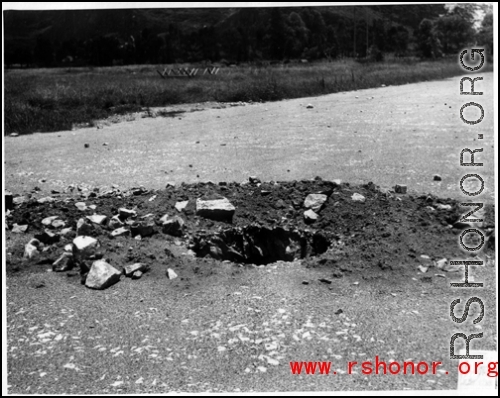 Remains of a blast in a runway, probably Liuzhou after retreat from the Japanese in 1944.