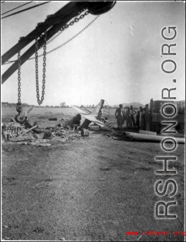 Burned American fighter, a P-51 or P-40, in Guangxi, China.