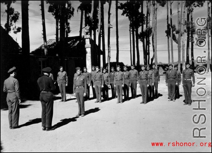 Hal Geer, 16th Combat Camera Unit photographer, receives award or promotion in China during WWII.