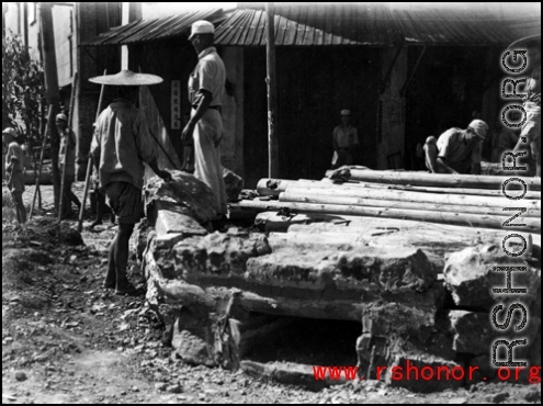 A Chinese Nationalist pill-box fortification being built in the road at an intersection in Guilin, before the Japanese advance in the fall of 1944.
