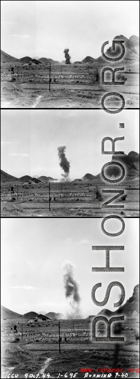 A P-40 fighter burns in the distance, October 9, 1944.  This is in Guangxi province, either Guilin or Liuzhou.