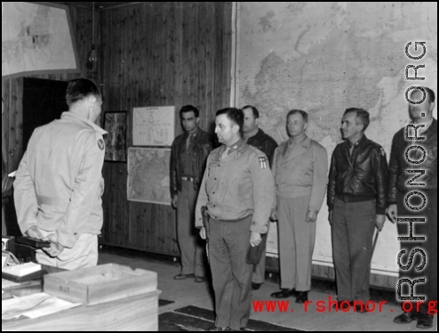 Award for crew of Casey Vincent. During WWII. Clinton D. "Casey" Vincent is the tall one in back, second from the right.  Far left is probably  Lt. Col. Grattan "Grant" Mahony (commander of the 76th Fighter Squadron).