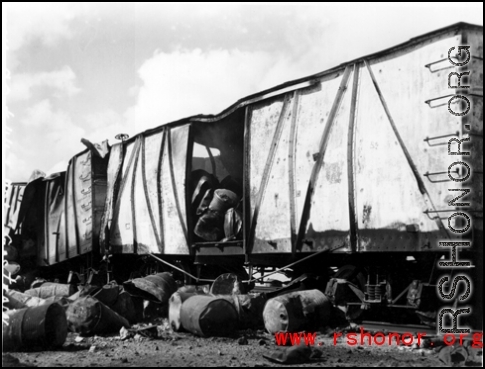 An American fuel train after bombing by Japanese bombers of September 27, 1944 during 45 minute air raid.