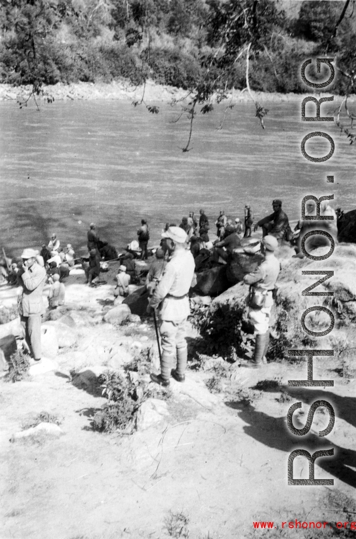 Chinese troops are river crossing in Yunnan province during WWII.