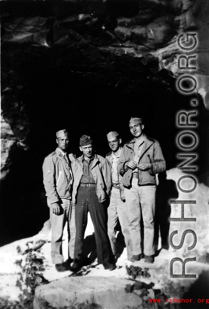 American GIs pose in a cave entrance in SW China during WWII.