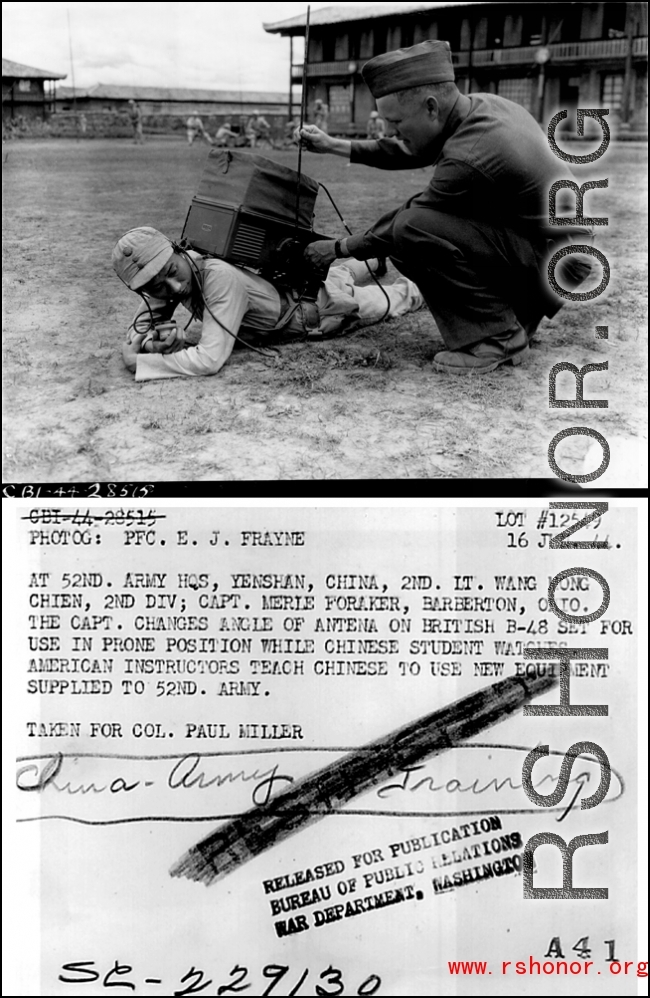 At 52nd Army HQS, Yenshan, China, 2nd Lt. Wang Mong Chien, 2nd Division; Capt. Merle Foraker, Barberton, OH.  The Capt. changes angle of antenna on British B-48 set for use in prone position while Chinese student watches. 