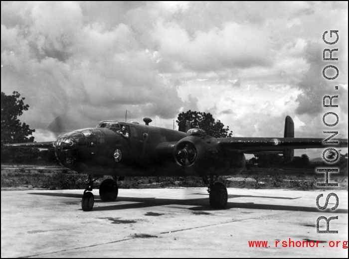 A B-25 of the Ringer Squadron, propellers spinning, in the CBI.