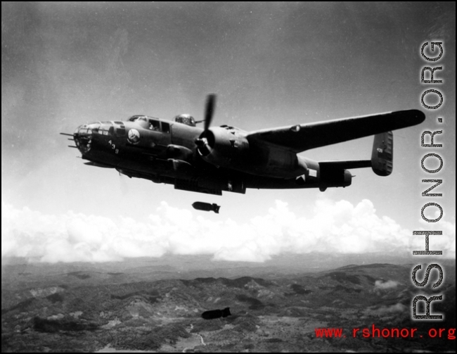 A B-25J of the 491st Bomb Squadron, drops bombs on a target somewhere in SW China or Burma. Named "Niagra's Belle", the squadron assigned combat id number '439' is visible on the tail and on the nose.