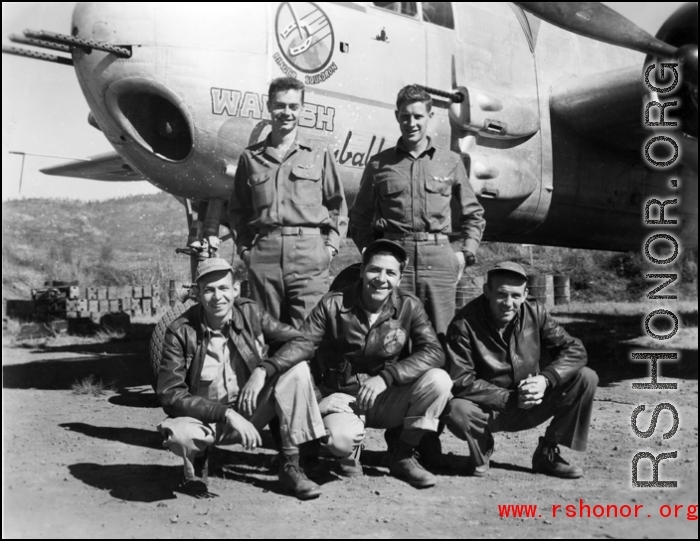 Crew of American servicemen with the B-25H "Wabash Cannonball", of the 491st Bomb Squadron, in the CBI.