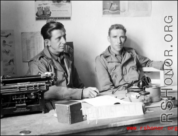 491st Bomb Squadron 1st Sergeant, Roy S. Bierbauer and an unidentified individual chat at the "Provost Sgt" desk in the orderly room, probably Yangkai, China.   (Info courtesy Tony Strotman)