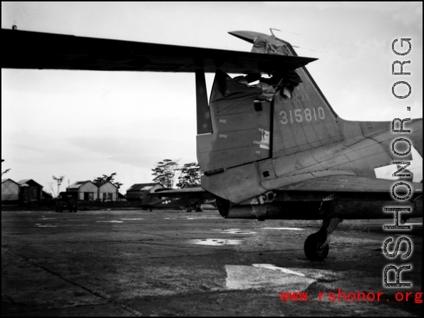 Clipped tail of C-47 transport #315810 in the CBI during WWII.    From the collection of David Firman, 61st Air Service Group.