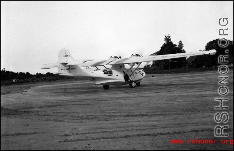 A PBY named 'Web Foot Maggie' in the CBI, tail number #433977.