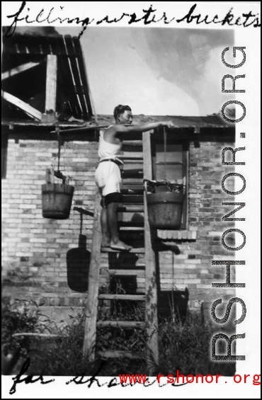 "Filling water buckets for showers" at an American air base in the CBI.