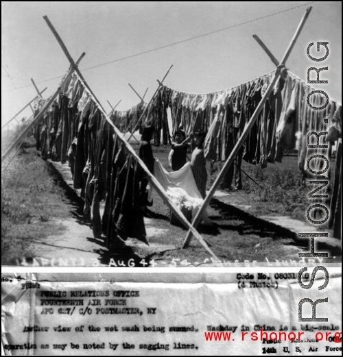 Chinese workers at an American base hang out the base laundry to dry in the sun, during WWII.  August 3, 1944