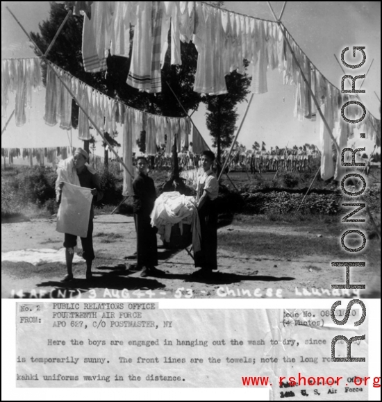 Chinese workers at an American base hang out the base laundry to dry in the sun, during WWII.  August 3, 1944