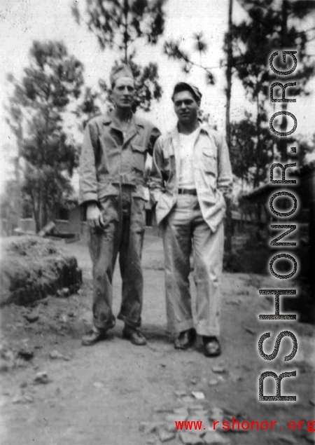 Thomas Clougherty, Fred Campangna pose on a pathway at an American base in the CBI, likely in Yunnan.