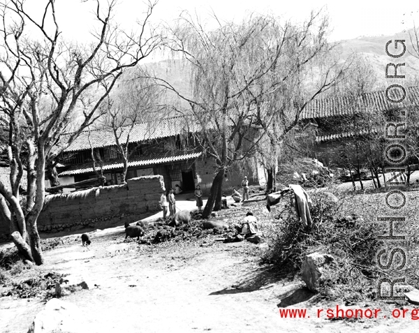 Local people in Yunnan province, China: People in a Village busy with daily lives.