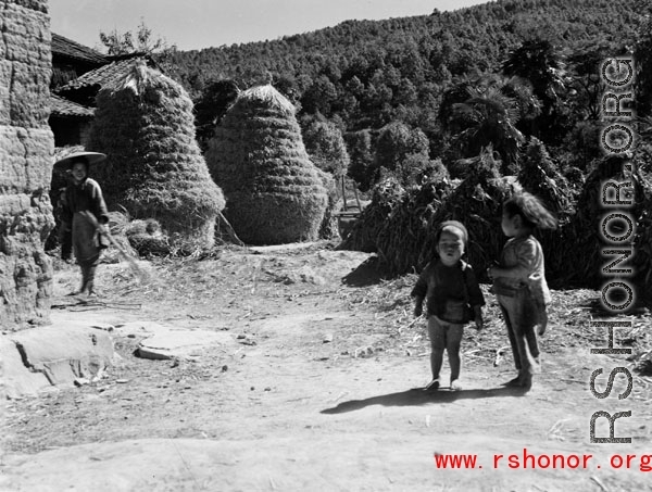 Local people in China: Kids in a village in China during WWII.