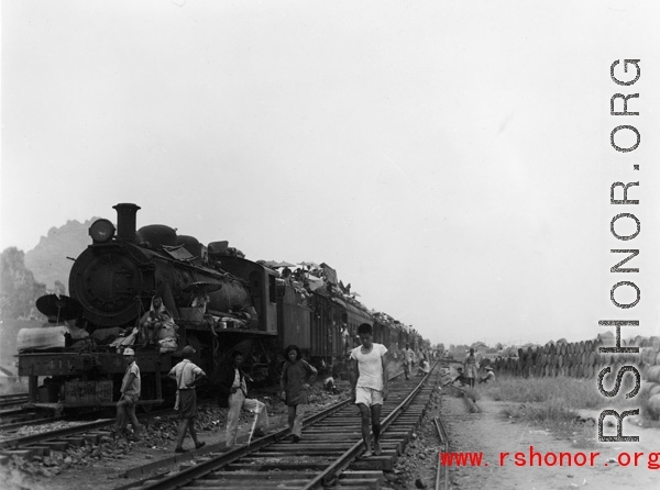 Chinese civilian evacuation in Guangxi province, China, during WWII, during the summer or fall of 1944 as the Japanese swept through as part of the large Ichigo push.