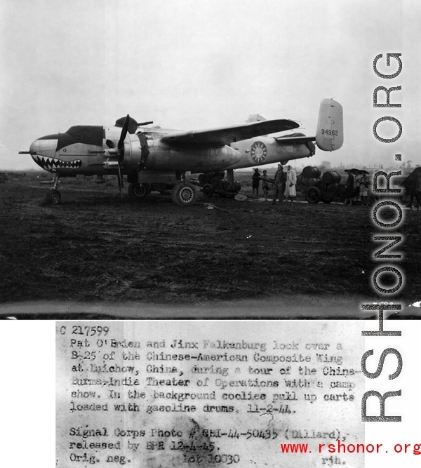 Pat O'Brien and Jinx Falkenburg look over a B-25 of the Chinese-American Composite Wing (CACW) at Liuzhou (Liuchow), China, during a tour of the China-Burma-India Theater (CBI) of Operations with a camp show.  In the background coolies pull up carts loaded with gasoline drums.  11-2-1944