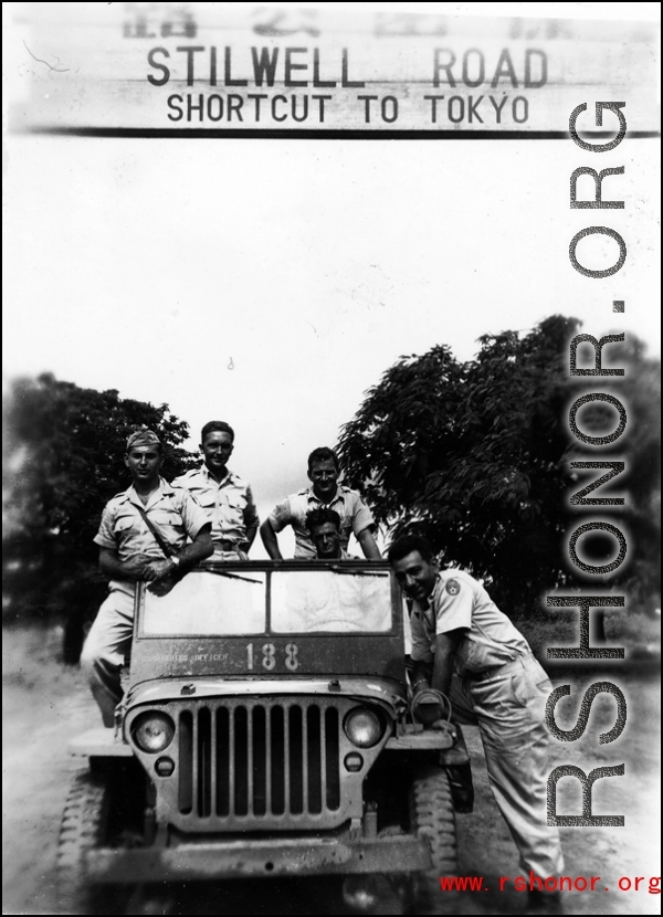 A jeep with American GIs in the CBI during WWII.  "The Stillwell Road, shortcut to Tokyo"