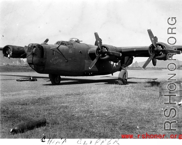 The B-24 "China Clipper" in the CBI, showing damage to one engine.  Selig Seidler was a member of the 16th Combat Camera Unit in the CBI during WWII.