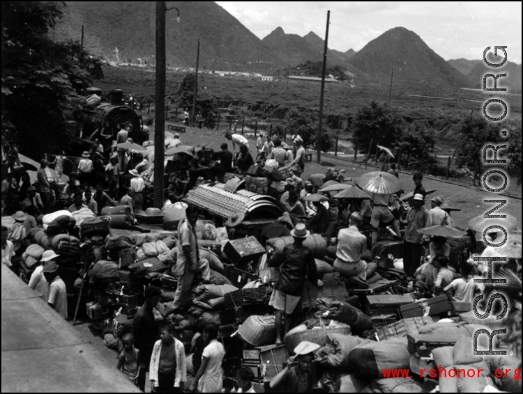 Refugees fleeing at the Guilin train station during the evacuation before the Japanese Ichigo advance in 1944, in Guangxi province.  Selig Seidler was a member of the 16th Combat Camera Unit in the CBI during WWII.