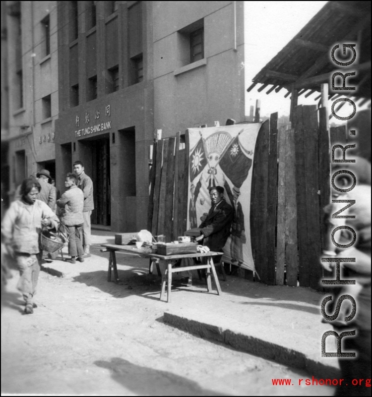 Scenes around Kunming city, Yunnan province, China, during WWII: A street side stall.