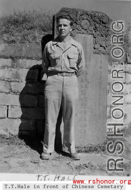 "T. T. Hale in front of a Chinese Cemetery"-- The gravestone behind is for the Ni family, erected 1877, during the Qing dynasty (Guangxu period).  In southwest China during WWII。