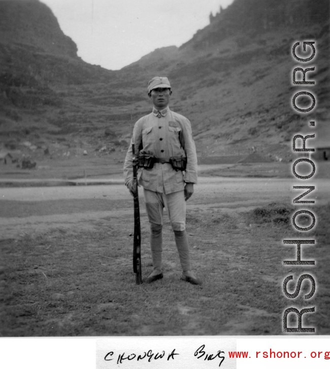 A "Chongwa Bing" (中国兵; Chinese soldier) guarding the base at Guilin (Kweilin) or Liuzhou (Liuchow) base, in Guangxi province, China, during the Second World War.